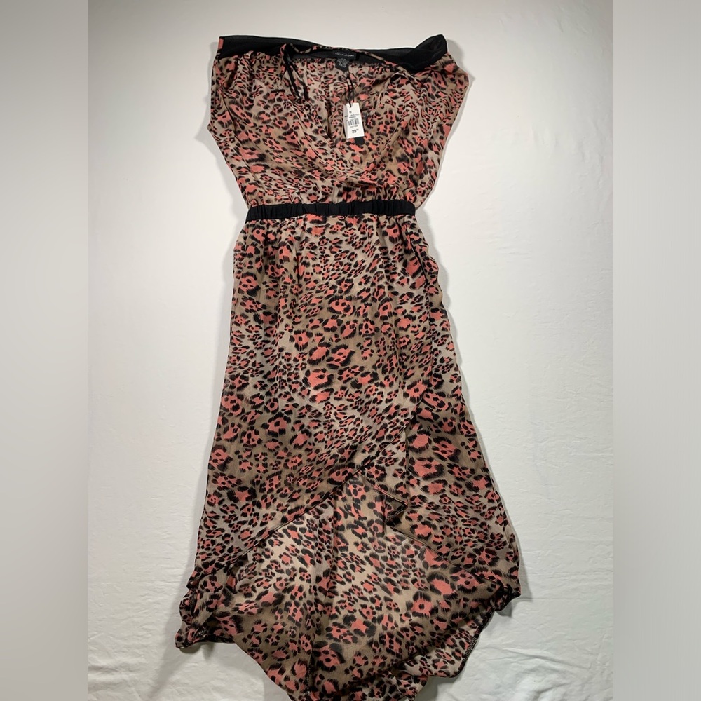Leopard Print seductions Dress with Black Accents
Size : medium
100% polyester